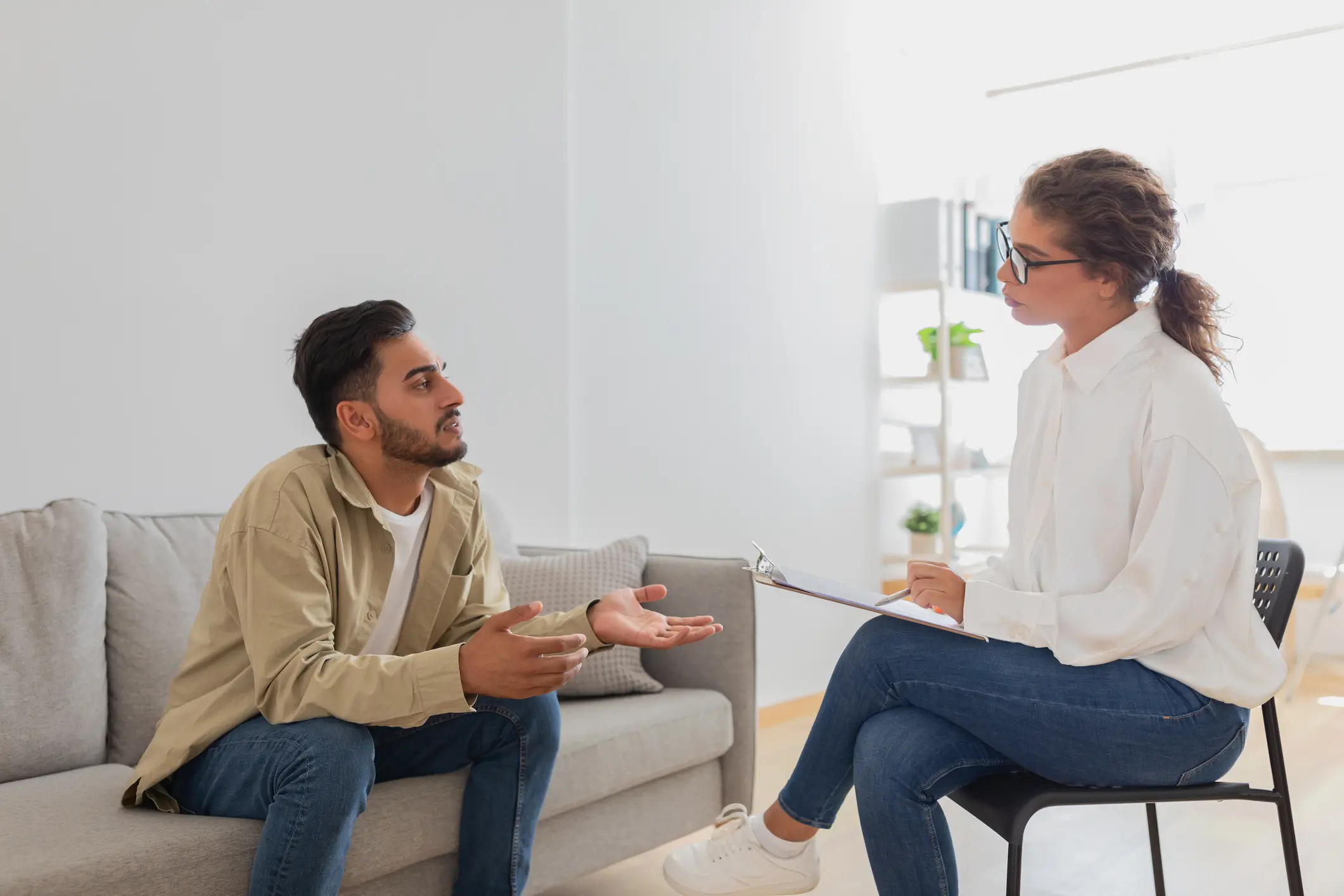 Man in therapy session with counselor