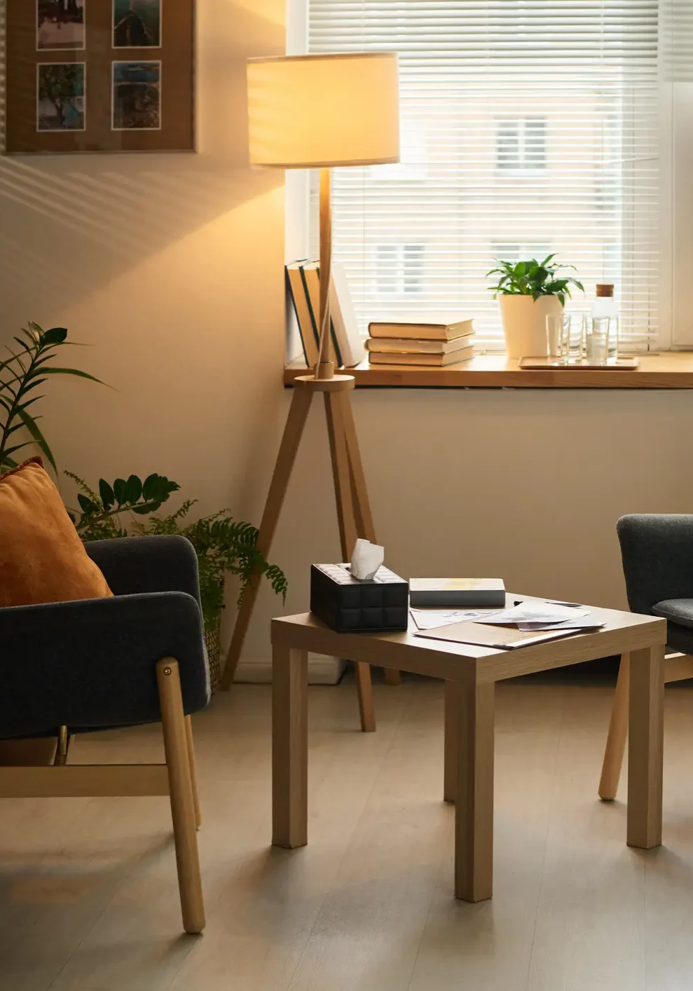 Cozy room with chairs and a table.
